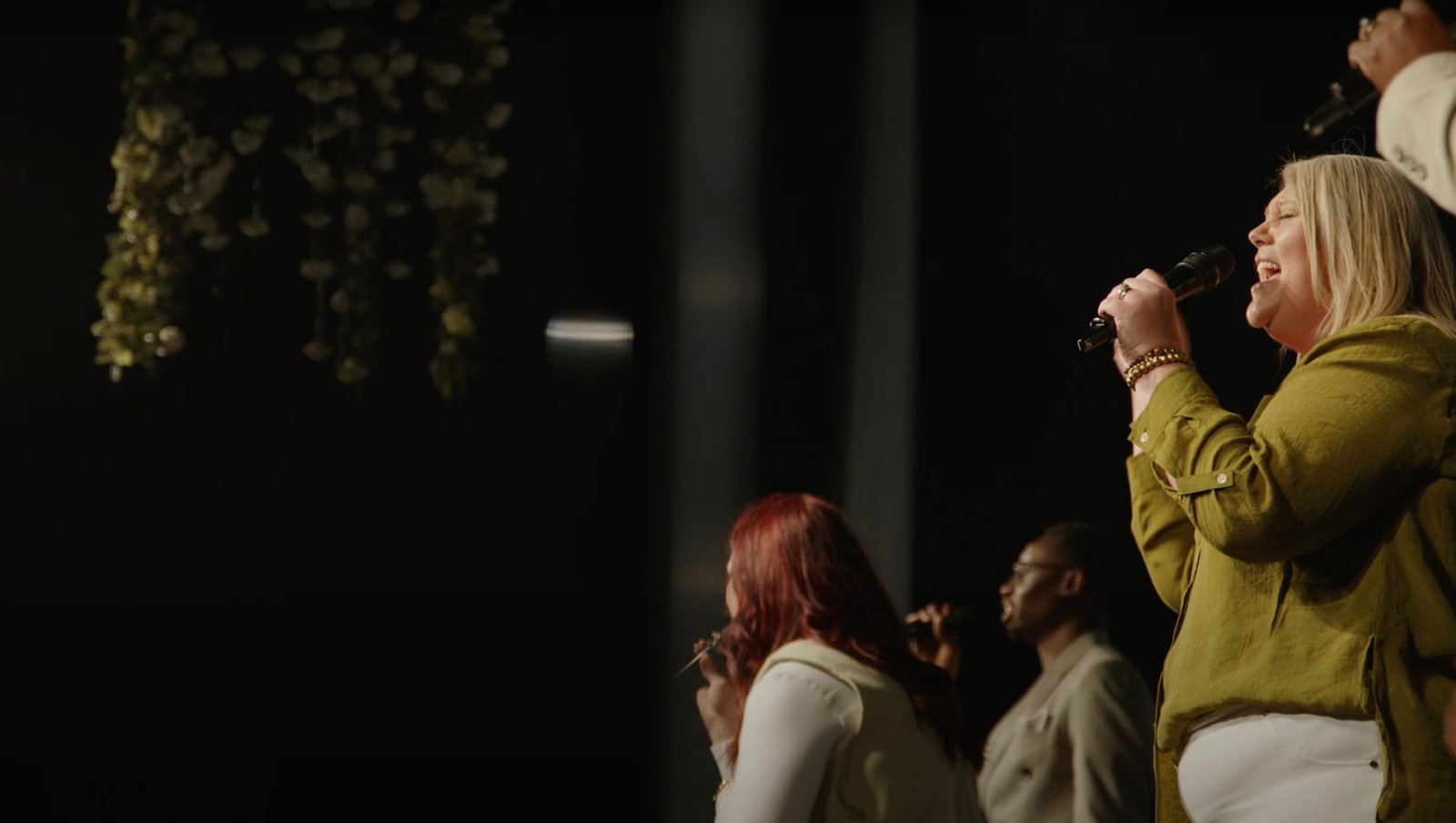 Worship team singing at Stone Edge Church