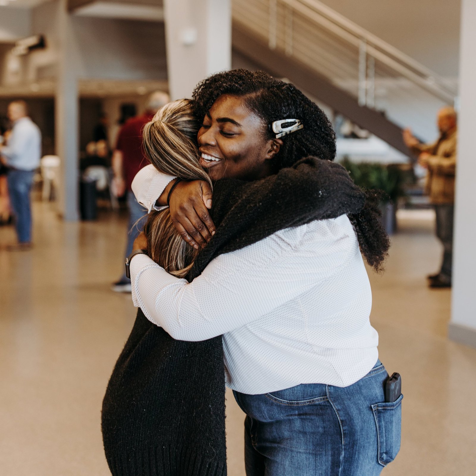 Two women embracing